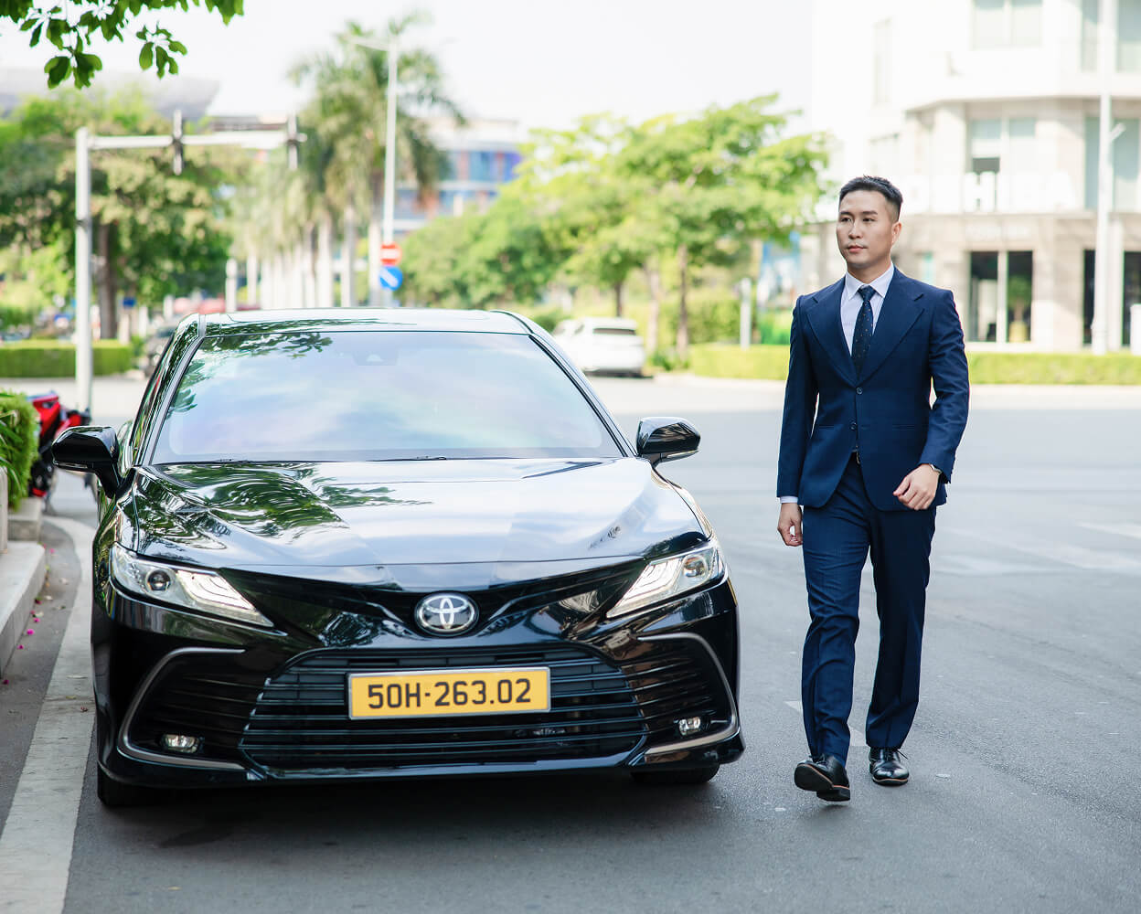 Black sedan and businessman