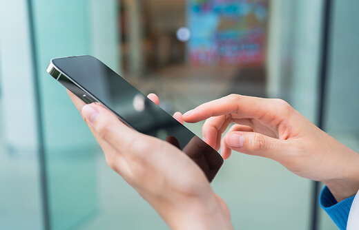 Person making a reservation on a smartphone