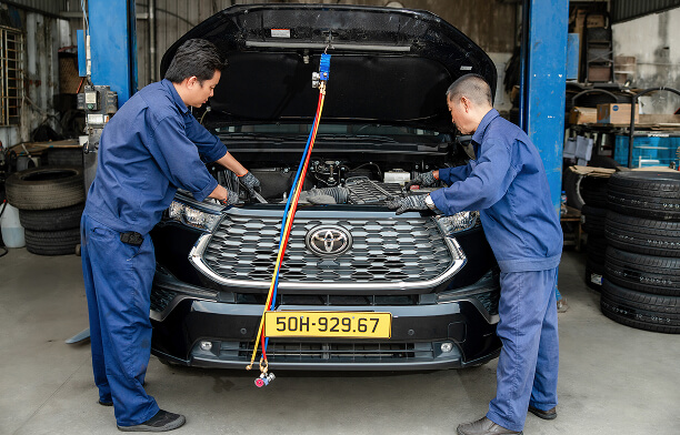 Maintenance team inspecting a vehicle